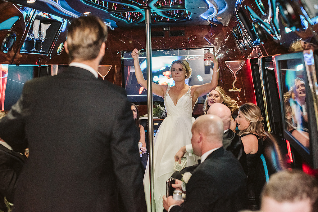 bride celebrating on party bus