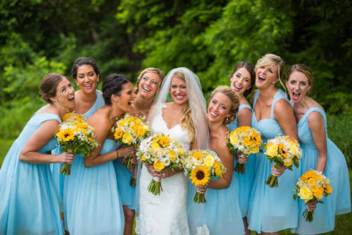 bride and bridemaids with sunflower bouquets