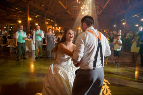 bride dancing with groom at reception